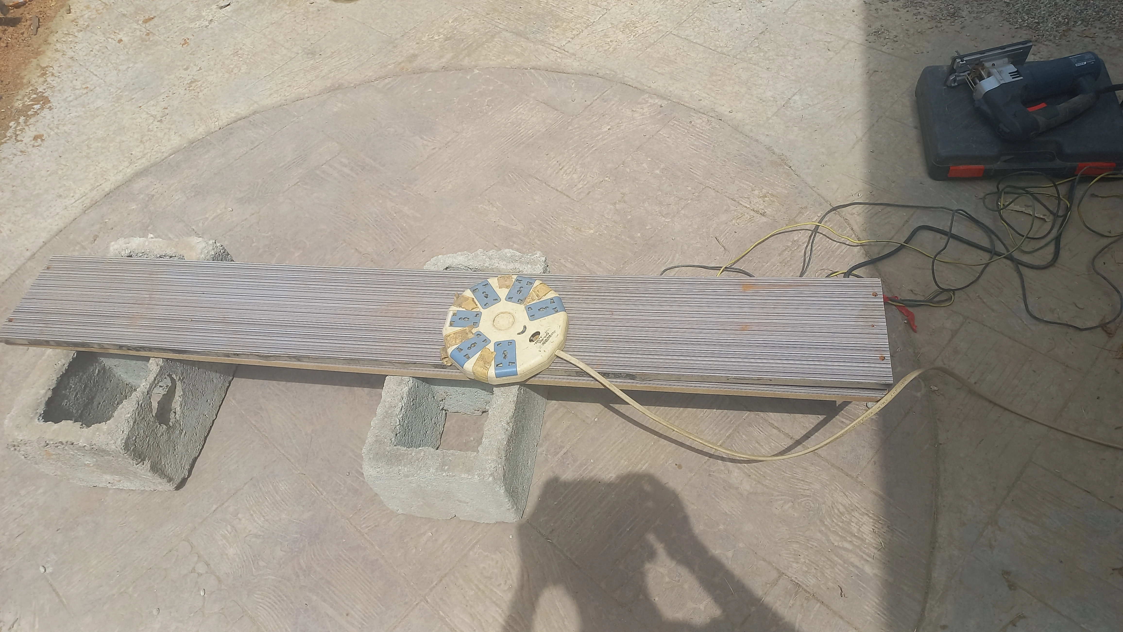 Composite board elevated for sizing assessment