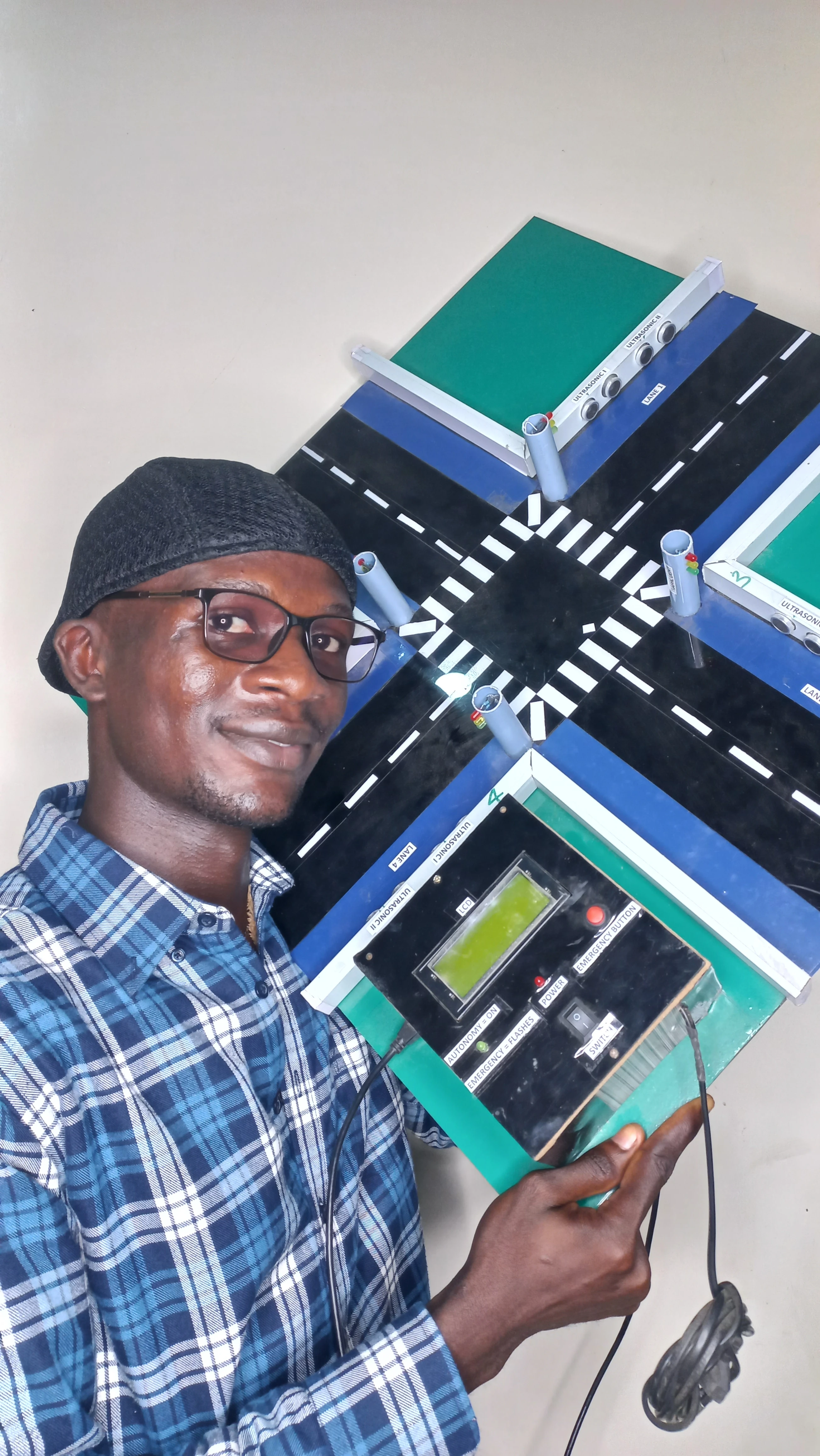 Developer presenting model from overhead showing full 4-lane intersection