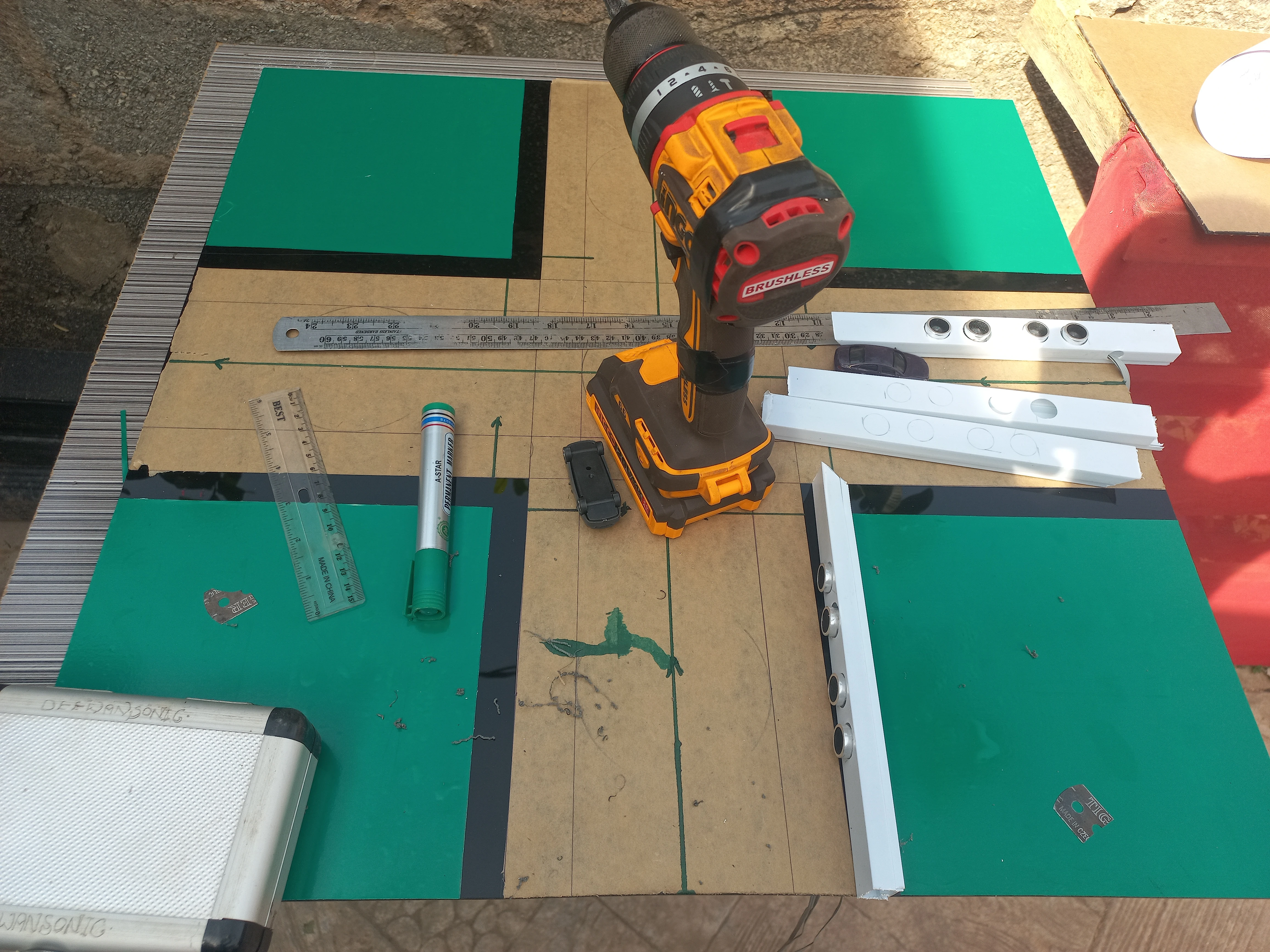 Drilling LED mounting holes along each lane stop-line