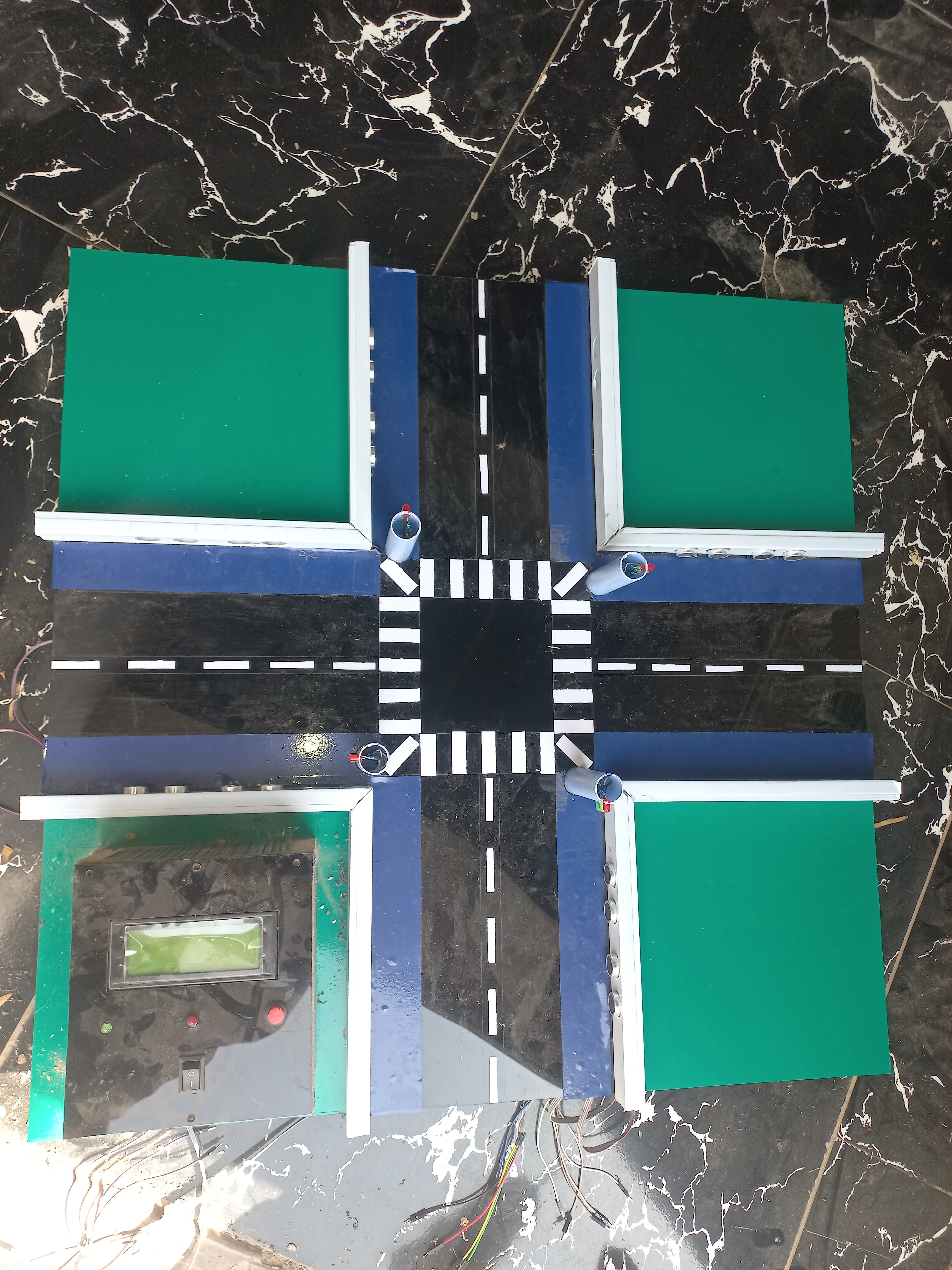 Overhead view of model with control box and wiring — angle 2