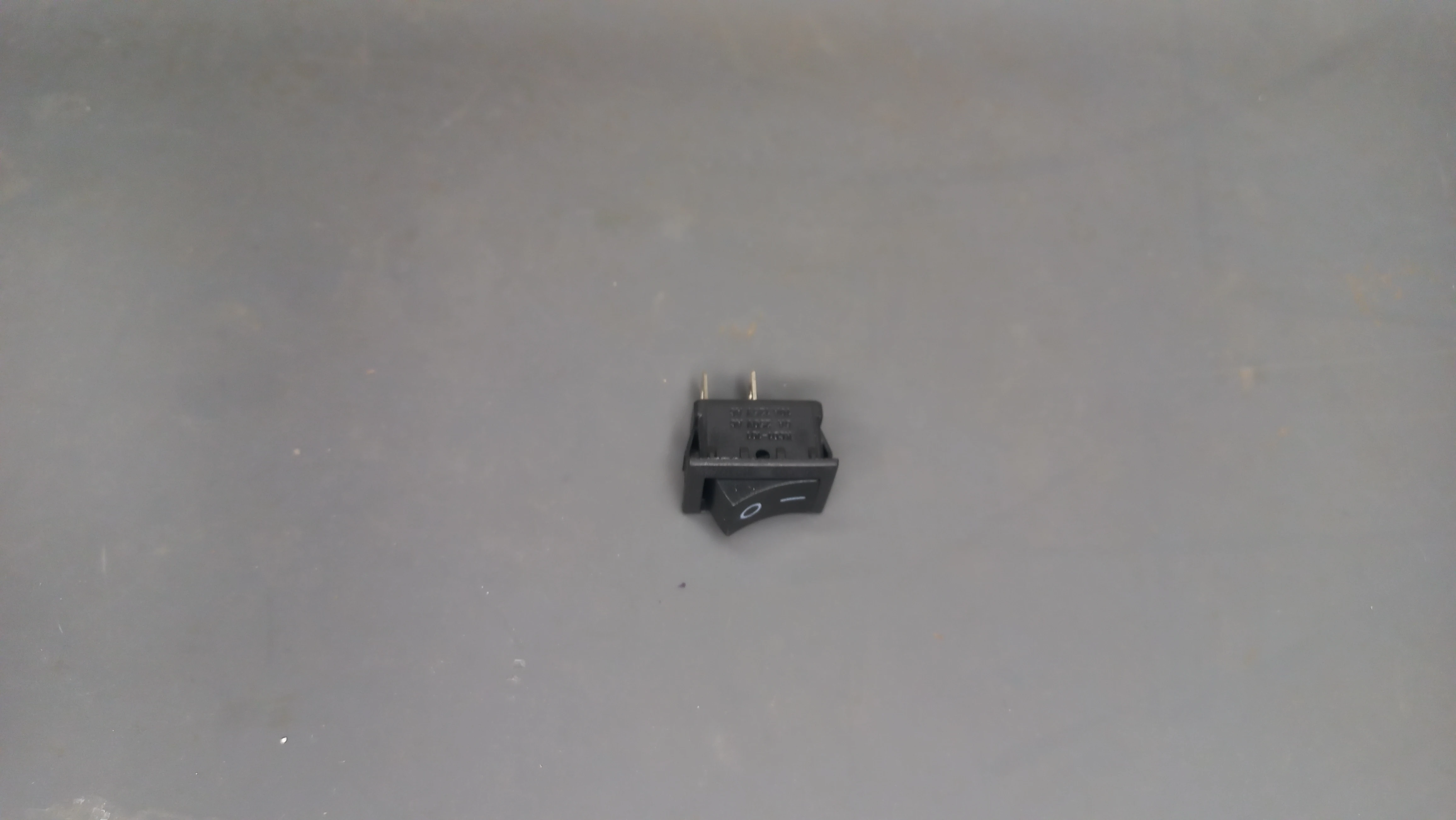 Rocker power switch — angle 1