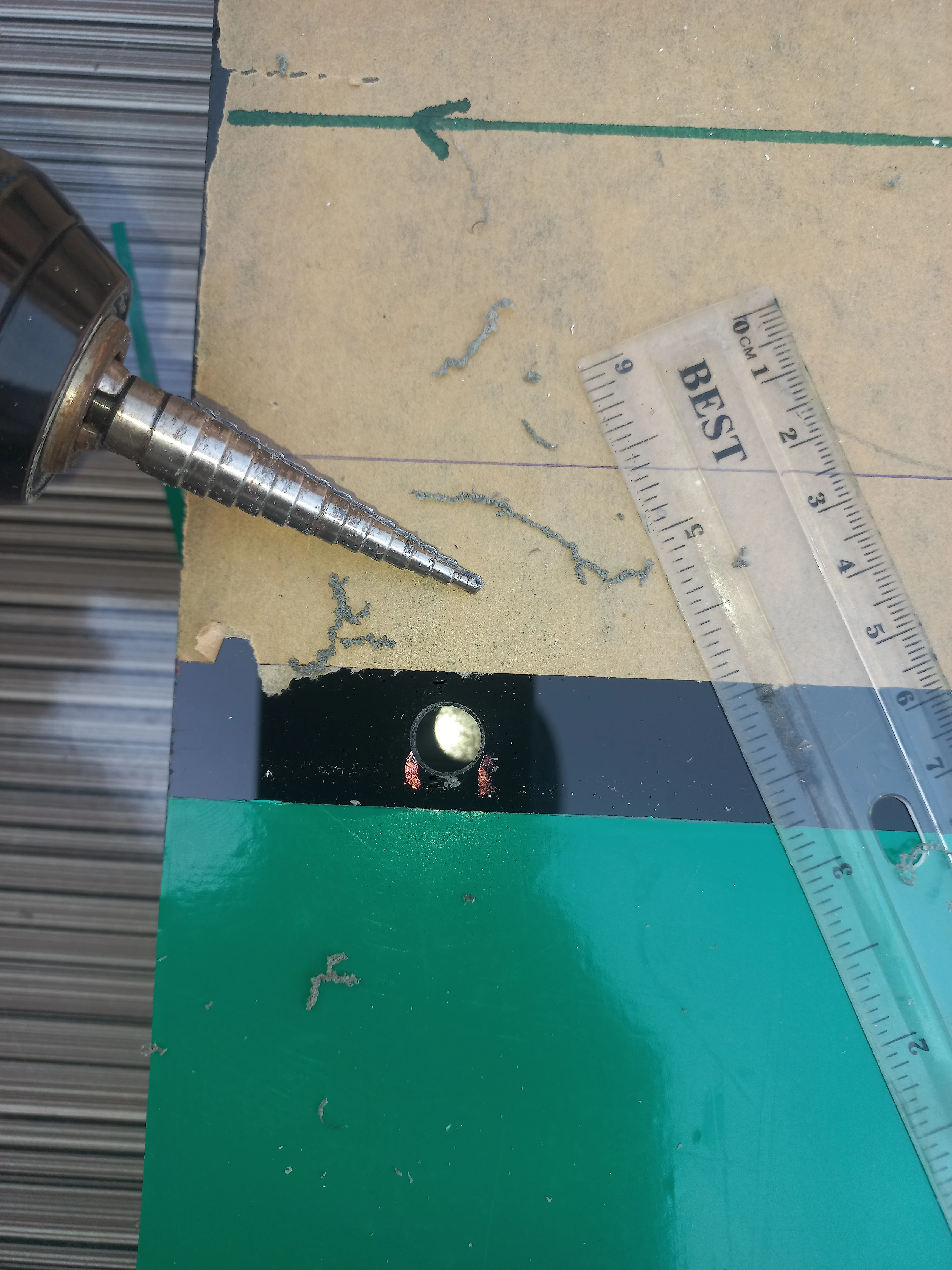 Step drill bit boring LED holes — view 2