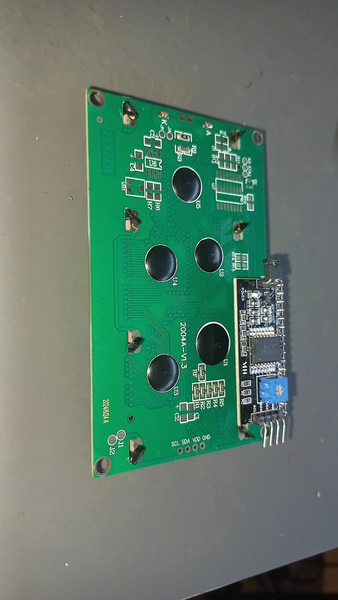 The back of the 20x4 LCD showing the I2C PCB module soldered on and the four-wire connector pigtail