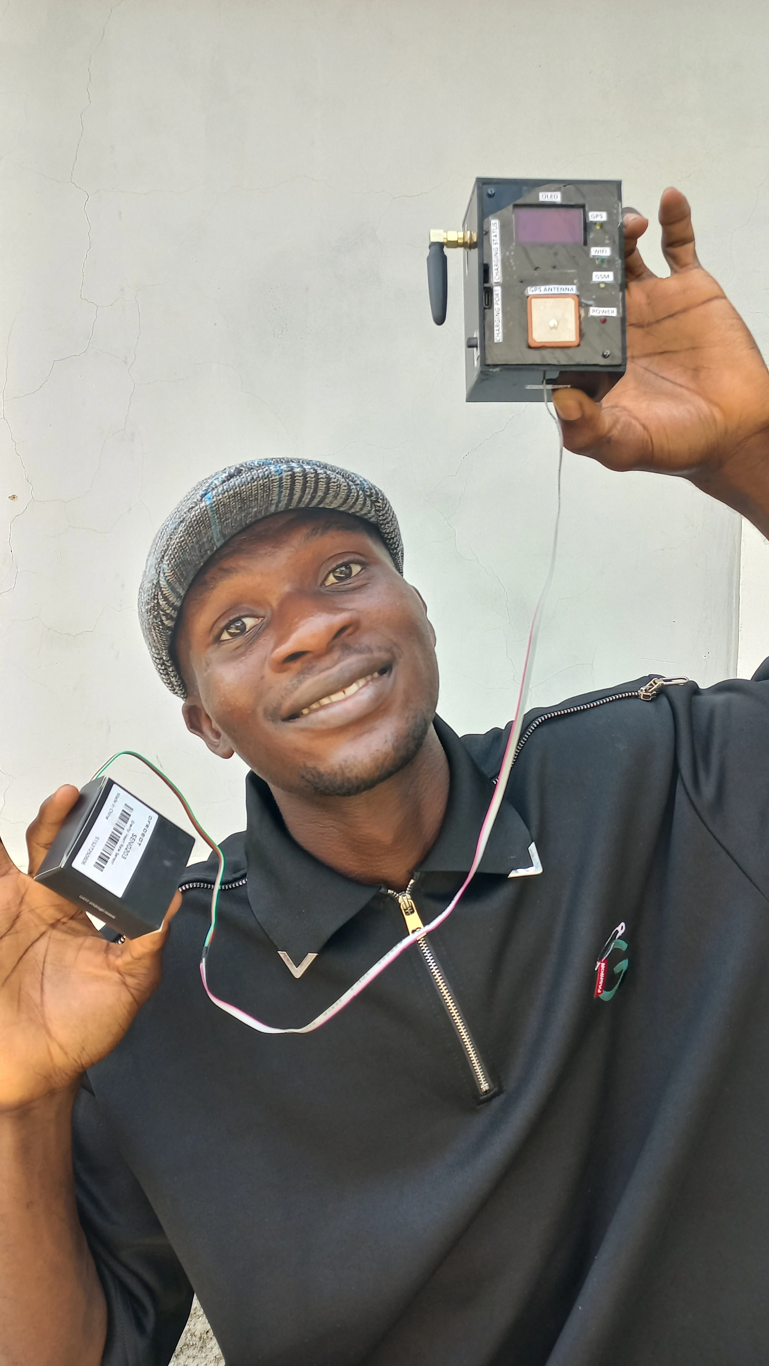 Developer smiling with labeled device prominently shown