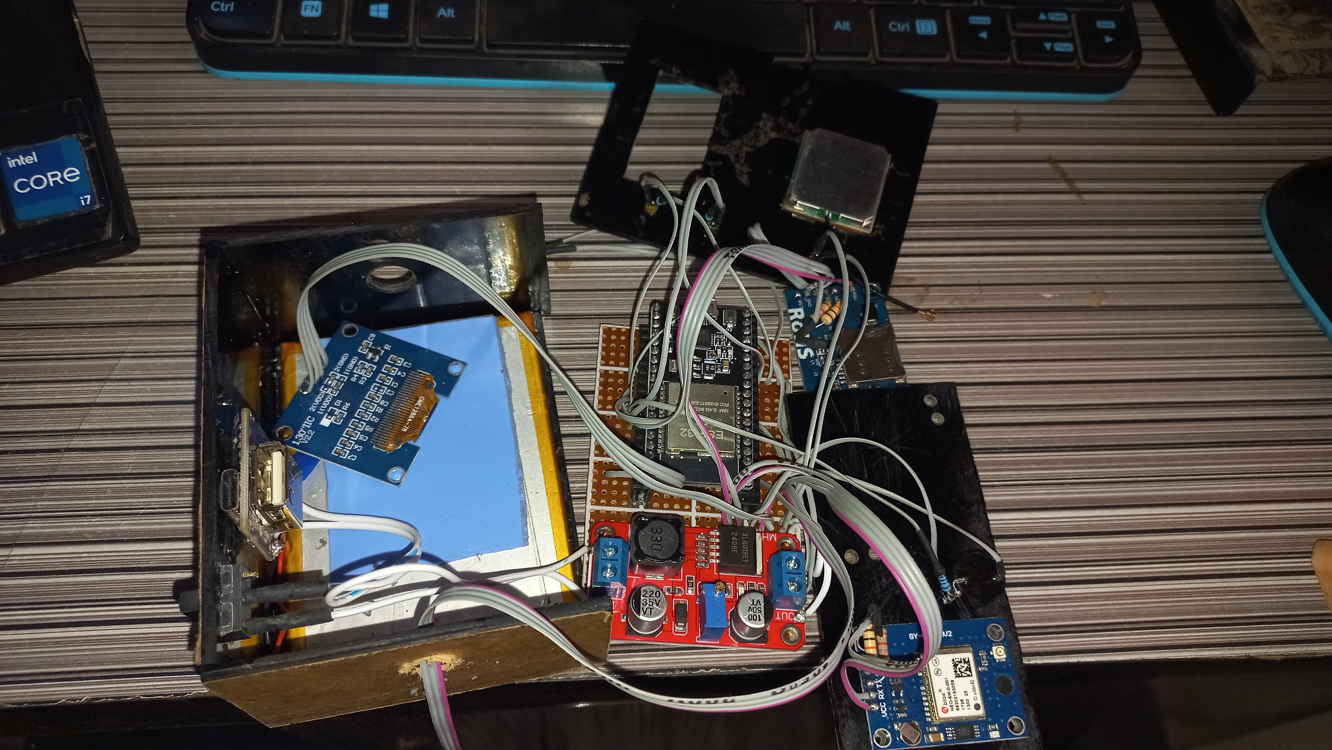 Device being housed in black electronic enclosure