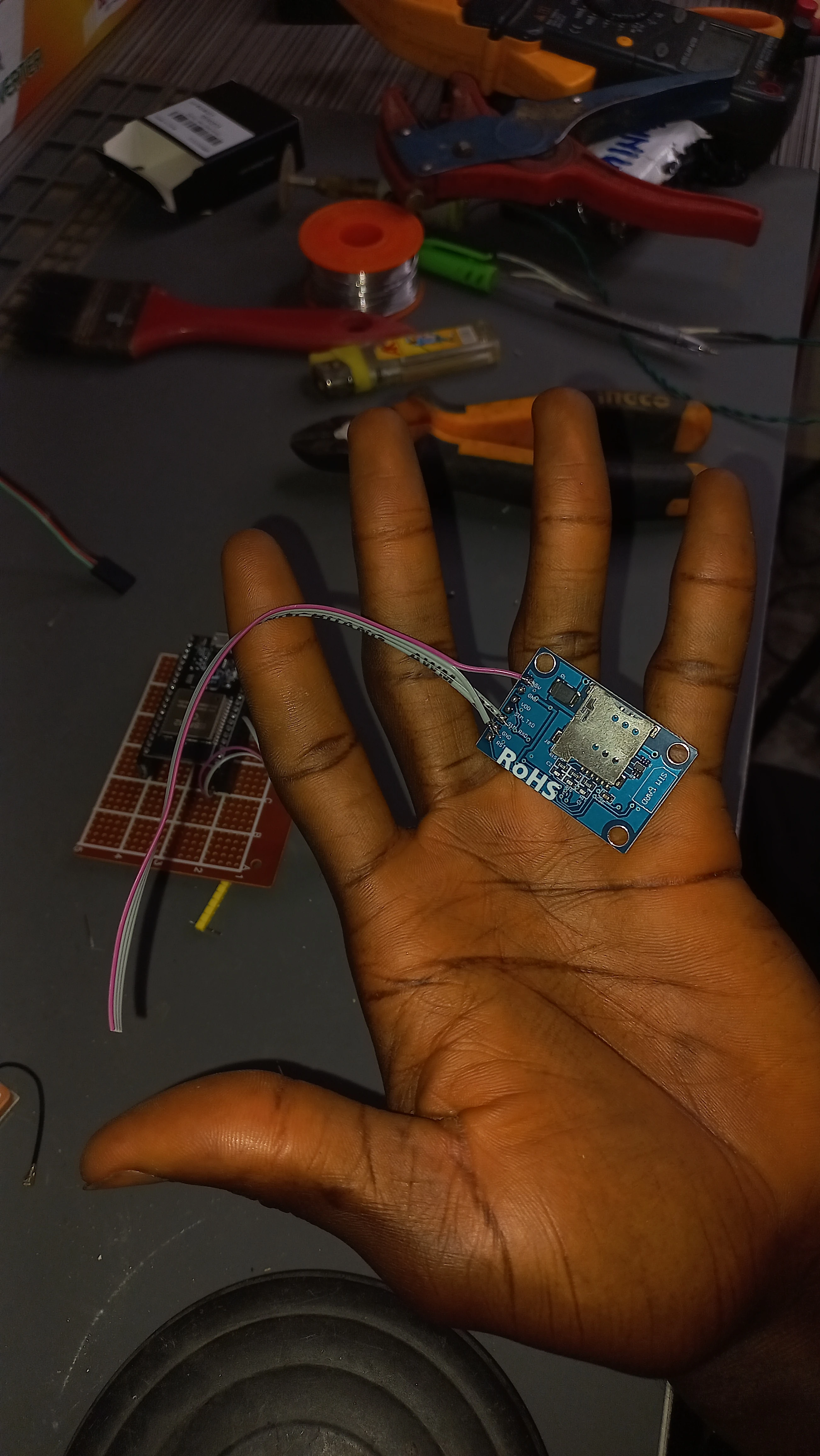 Hand holding SIM800L