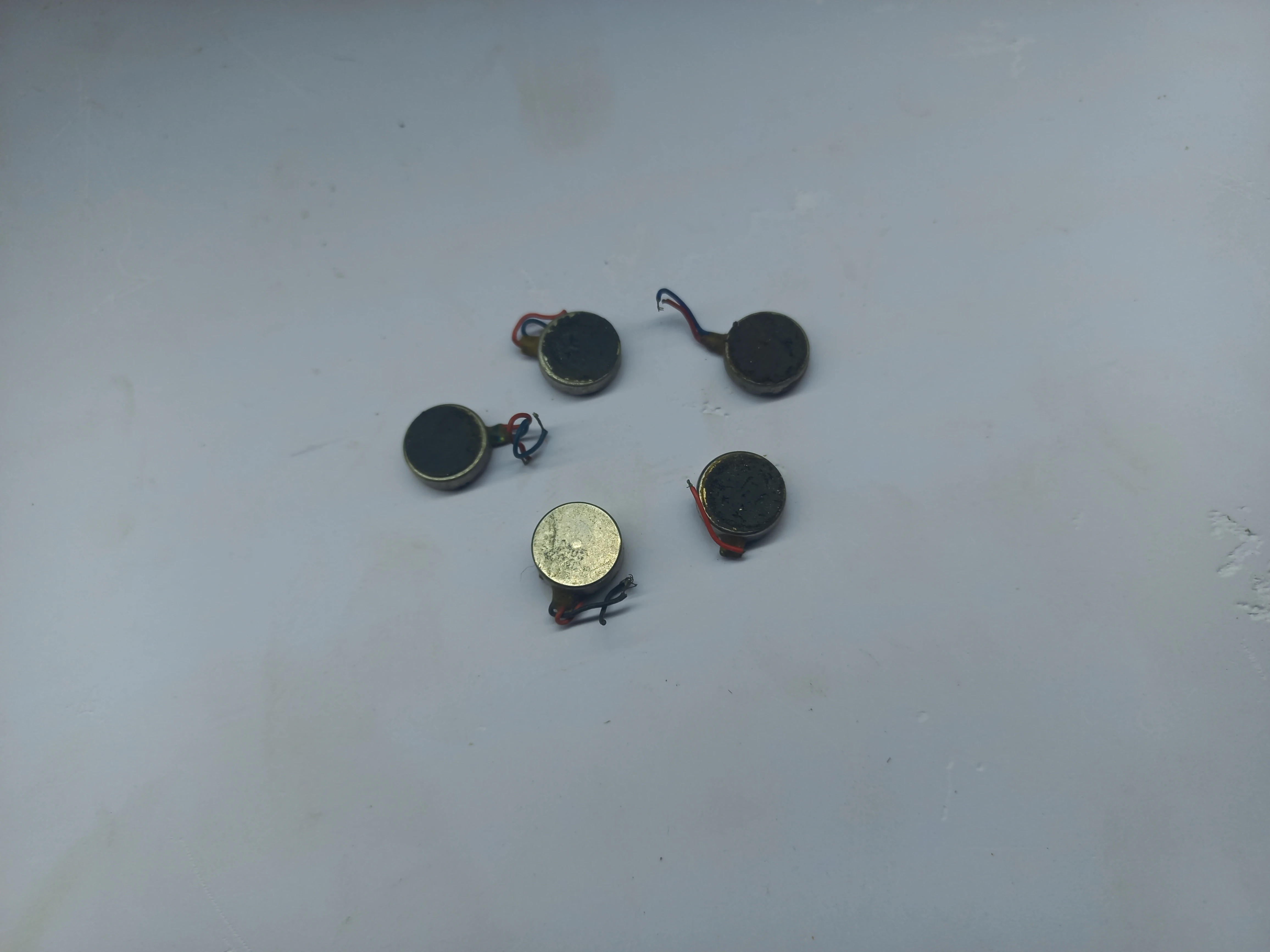 Coin-type vibration motors: the haptic actuators fitted inside the wearable unit